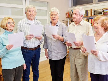 Group,Of,Seniors,With,Dementia,Singing,Together,In,A,Choir