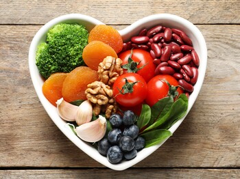 Bowl,With,Products,For,Heart-healthy,Diet,On,Wooden,Background,,Top