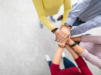 Close,Up,Top,View,Of,Young,Business,People,Putting,Their